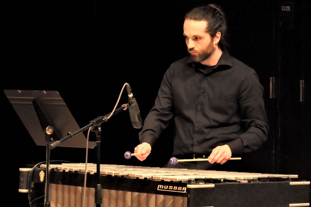 A musician playing on stage