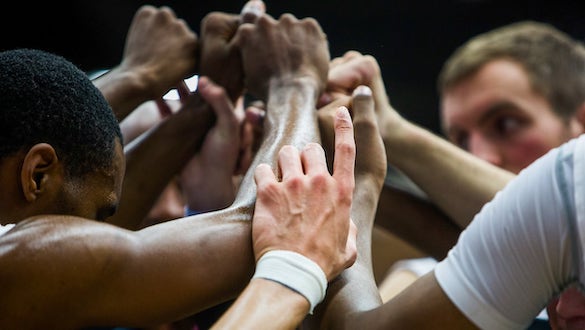 Men's basketball huddle