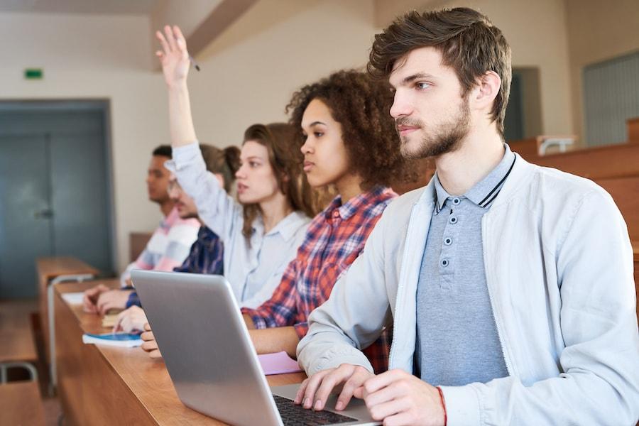 "college students inside a classroom"