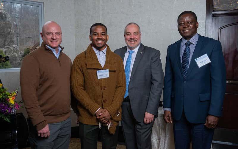 Dr. Doug Hirschhorn, Kwadir Delgado-McIntyre, President Joe Bertolino, and MBA Director and Professor of Finance Benjamin A. Abugri