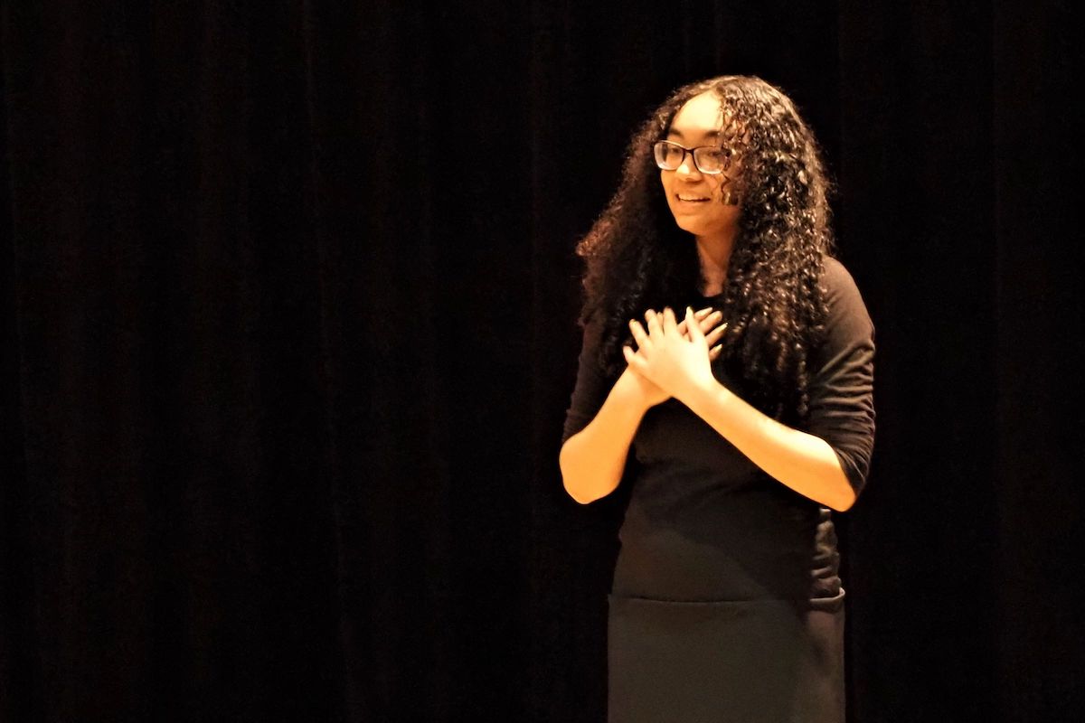 A woman performing on stage