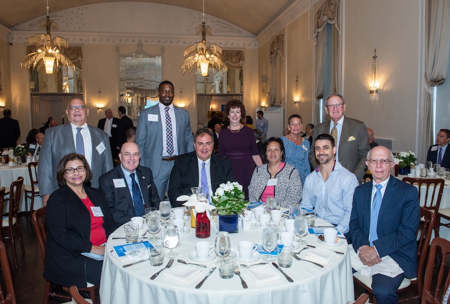 A bunch of board member sitting around a round table