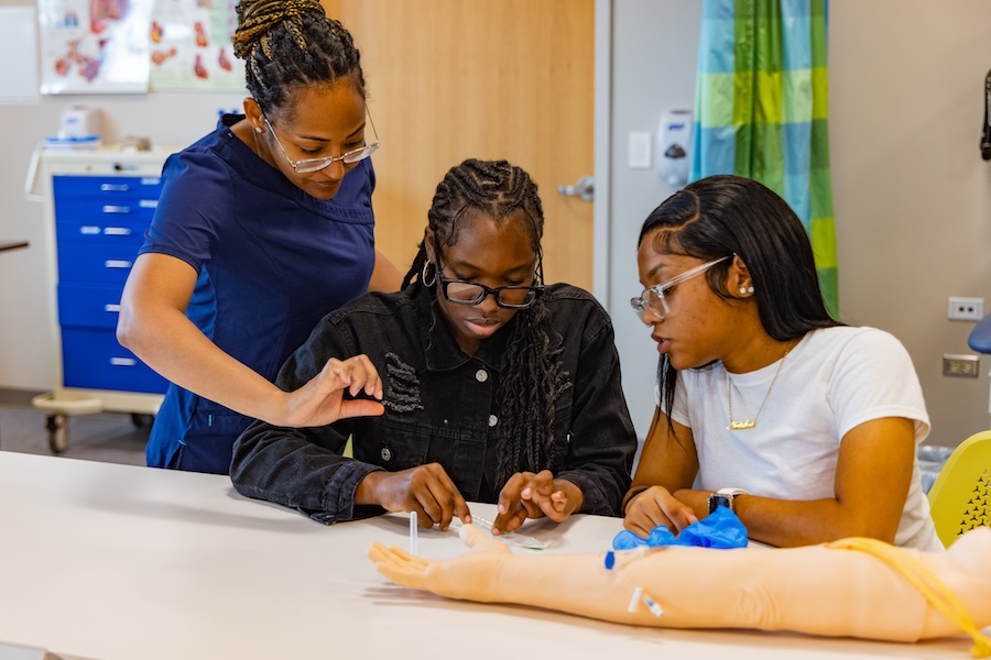 Three students studying to be a nurse